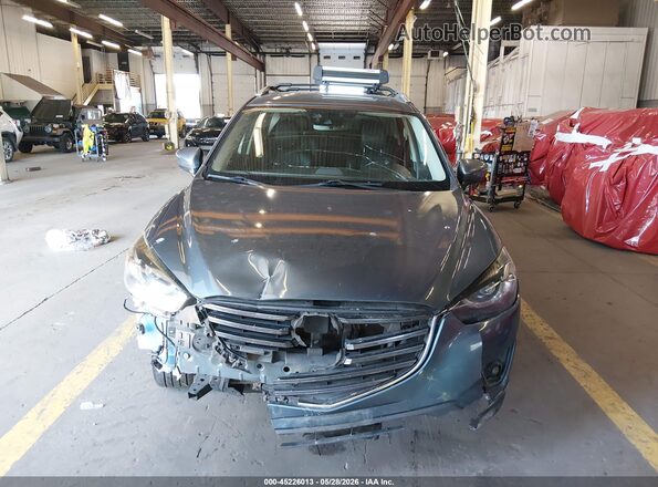 JM3KE4DY0G0782755 2016 MAZDA CX-5 Dark Blue Widok wnętrza z tyłu