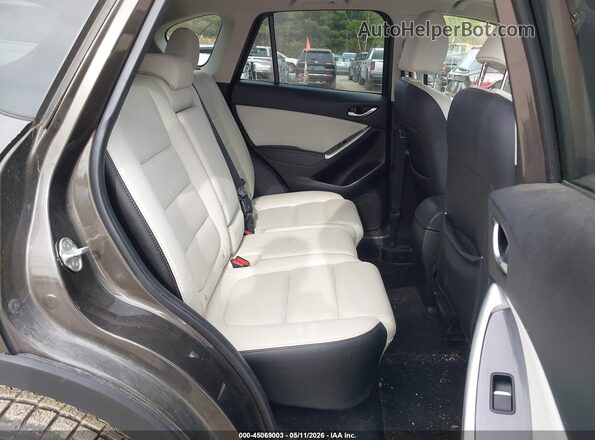 JM3KE4DY3G0670404 2016 MAZDA CX-5 Brown Вид наклейки з VIN-кодом