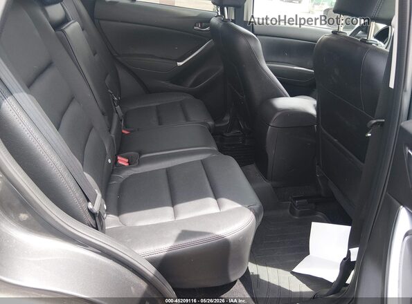 JM3KE4DY4G0904078 2016 MAZDA CX-5 Gray Widok naklejki z numerem VIN