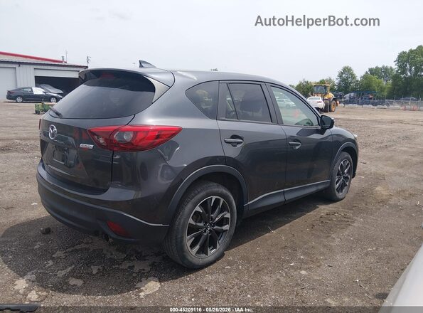JM3KE4DY4G0904078 2016 MAZDA CX-5 Gray Widok wnętrza z tyłu