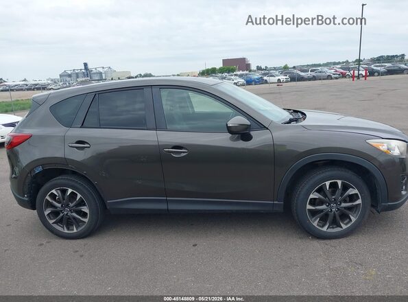 JM3KE4DYXG0809105 2016 MAZDA CX-5 Gray Vista interior trasera