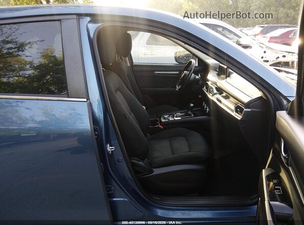 JM3KFABM3K0542989 2019 MAZDA CX-5 Blue Widok wnętrza z przodu