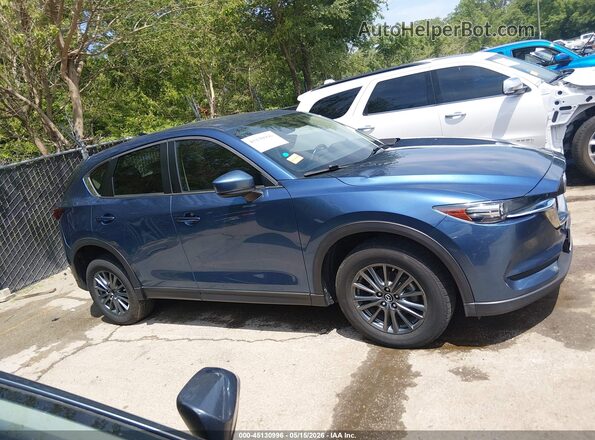 JM3KFABM3K0542989 2019 MAZDA CX-5 Blue Widok wnętrza z tyłu