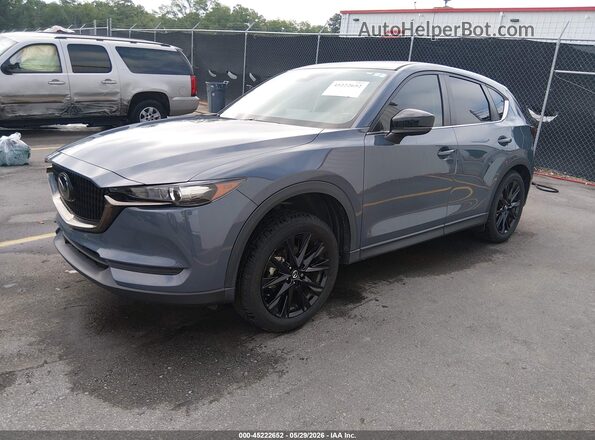 JM3KFACM4M0394353 2021 MAZDA CX-5 Blue Vista tres cuartos delantera izquierda