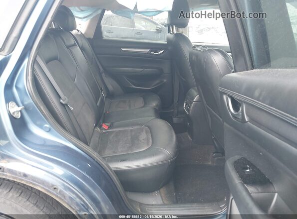 JM3KFACM9J0330563 2018 MAZDA CX-5 Blue VIN კოდის სტიკერის ხედი