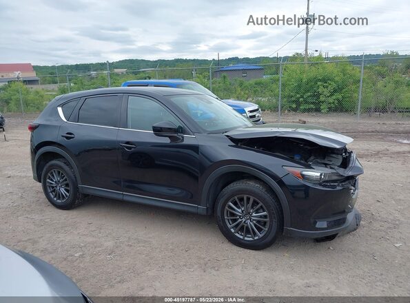 JM3KFACMXK1574685 2019 MAZDA CX-5 Черный Вид задней части салона