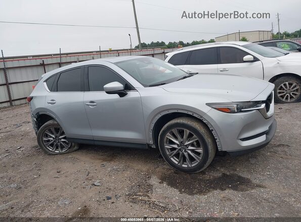 JM3KFADM2M1340123 2021 MAZDA CX-5 Silver Widok wnętrza z tyłu