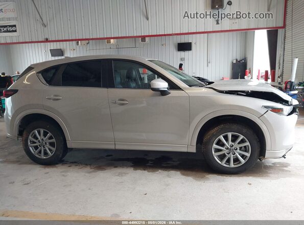 JM3KFBBL3R0446576 2024 MAZDA CX-5 Beige Rear interior view