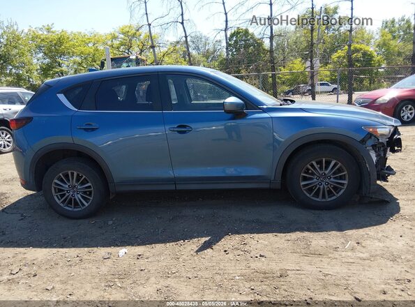 JM3KFBBM4J0415155 2018 MAZDA CX-5 Blue Widok wnętrza z tyłu