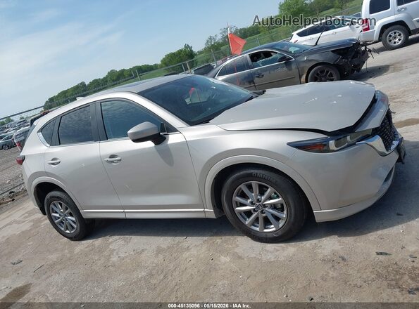 JM3KFBCL0S0565139 2025 MAZDA CX-5 Tan Սալոնի հետևի տեսք