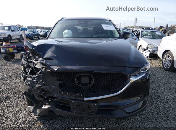 JM3KFBCM1J0438875 2018 MAZDA CX-5 Черный Вид задней части салона