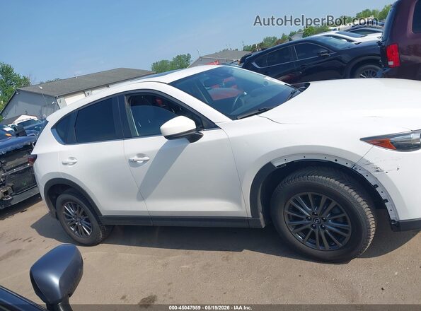 JM3KFBCM4K0590862 2019 MAZDA CX-5 White Vista interior trasera