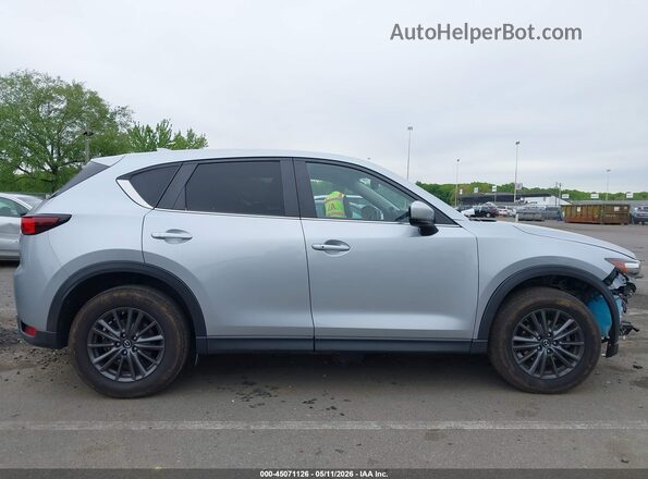 JM3KFBCM6L0794371 2020 MAZDA CX-5 Silver Rear interior view