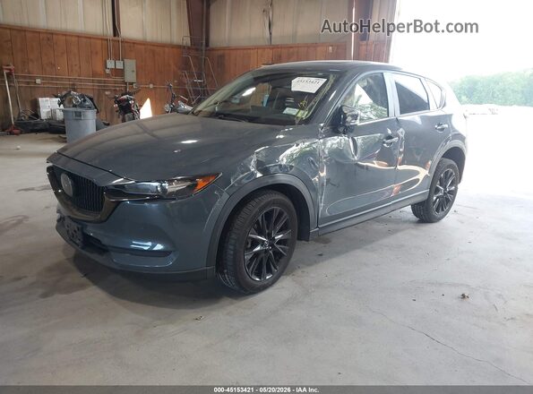 JM3KFBCM7M0493884 2021 MAZDA CX-5 Gray Vista tres cuartos delantera izquierda