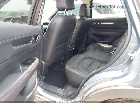 JM3KFBCM7N1582091 2022 MAZDA CX-5 Light Blue Vista de la etiqueta del VIN