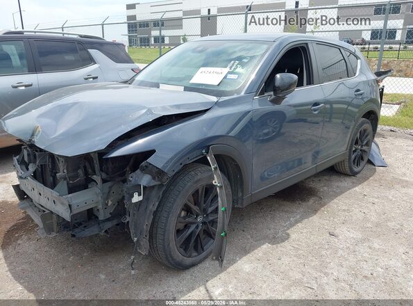 JM3KFBCM7N1582091 2022 MAZDA CX-5 Light Blue Vista tres cuartos delantera izquierda