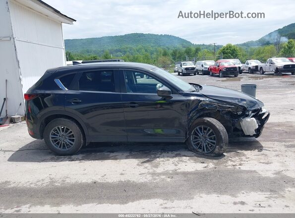 JM3KFBCM8M0338891 2021 MAZDA CX-5 Black Սալոնի հետևի տեսք