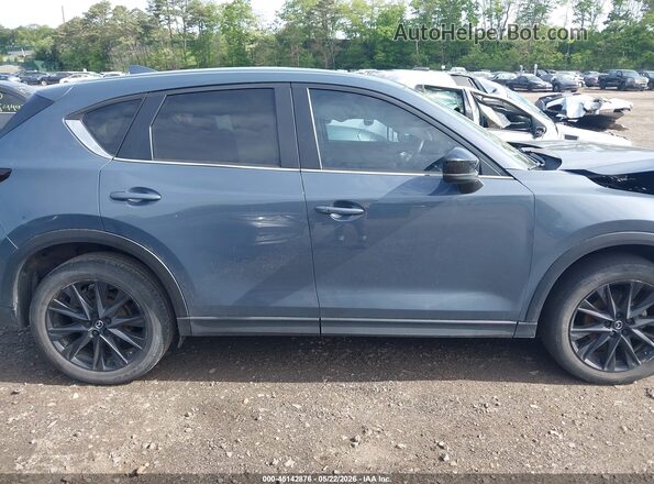 JM3KFBCM8R0381473 2024 MAZDA CX-5 Blue Widok wnętrza z tyłu