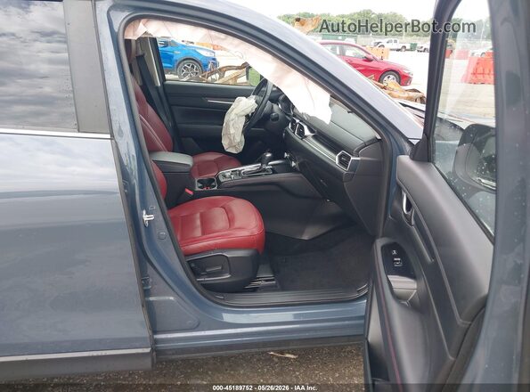 JM3KFBCM9P0120916 2023 MAZDA CX-5 Blue Front interior view