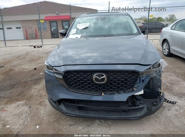 JM3KFBCM9P0167041 2023 MAZDA CX-5 Blue Vista del salpicadero