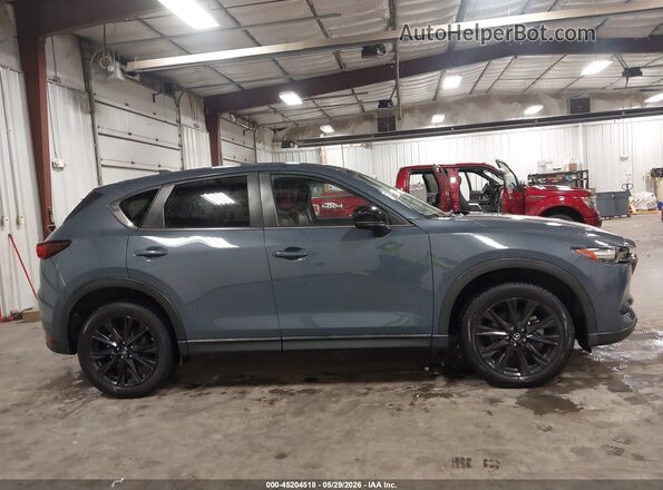 JM3KFBCY7M0380049 2021 MAZDA CX-5 Gray Widok wnętrza z tyłu