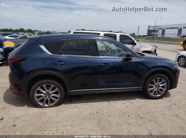 JM3KFBDM0M0327706 2021 MAZDA CX-5 Blue Rear interior view