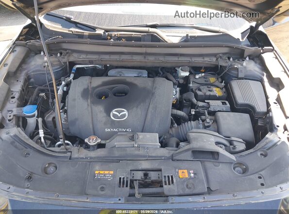 JM3KFBDM4P0142210 2023 MAZDA CX-5 Navy Vista trasera