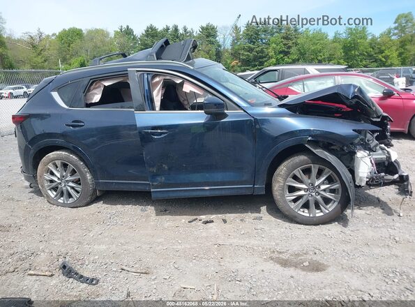 JM3KFBEM4S0636655 2025 MAZDA CX-5 Blue Вид задньої частини салону