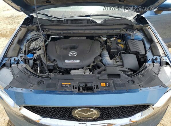 JM3KFBEY7M0396507 2021 MAZDA CX-5 Teal Rear interior view