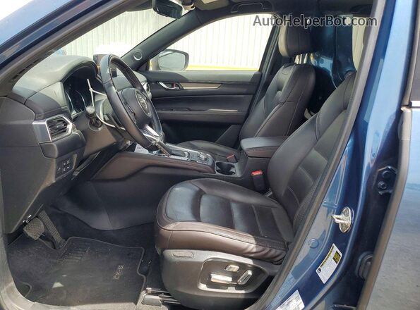 JM3KFBEY7M0396507 2021 MAZDA CX-5 Teal Front interior view