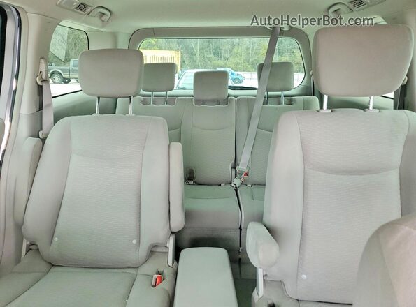JN8AE2KP9G9150386 2016 NISSAN QUEST Silver Rear seats view