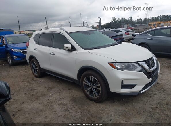 JN8AT2MT2KW263509 2019 NISSAN ROGUE White Vista interior trasera
