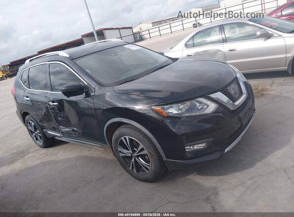 JN8AT2MT5HW403478 2017 NISSAN ROGUE Black Vista interior trasera