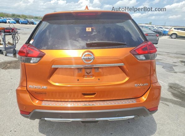 JN8AT2MV9LW104859 2020 NISSAN ROGUE Оранжевый Вид сзади
