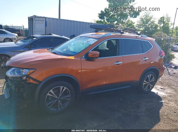 JN8AT2MVXKW373497 2019 NISSAN ROGUE Orange 360 interior view
