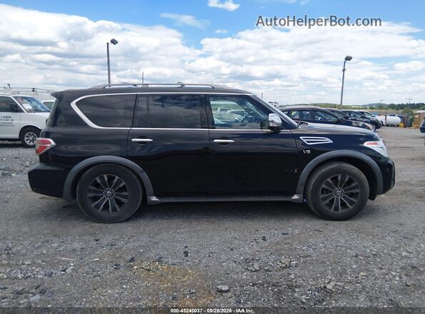 JN8AY2NE3H9702211 2017 NISSAN ARMADA Black Vista interior trasera