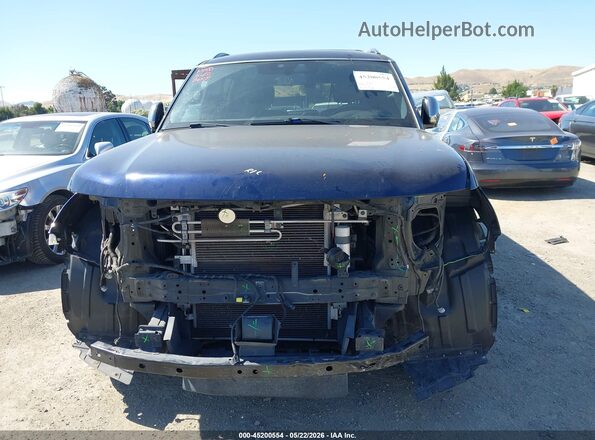 JN8AY2NE6J9734124 2018 NISSAN ARMADA Dark Blue Вид задньої частини салону