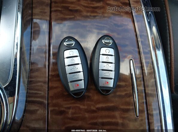 JN8AY2NE8J9733895 2018 NISSAN ARMADA Белый Вид панели приборов