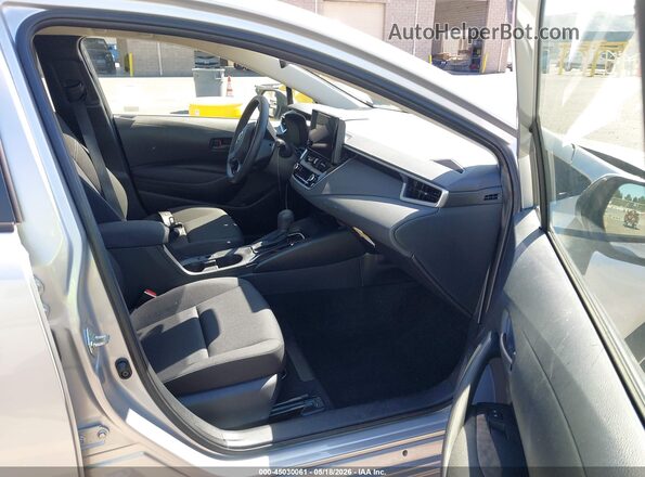 JTDB4MEE3S3032046 2025 TOYOTA COROLLA Silver Widok wnętrza z przodu