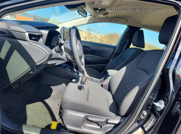 JTDB4MEE9T3035079 2026 TOYOTA COROLLA Черный Вид салона спереди