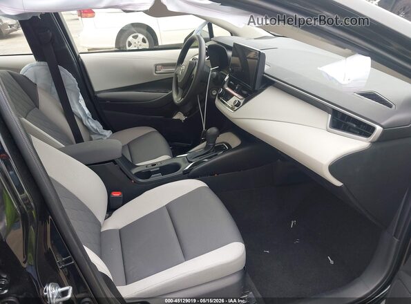 JTDBCMFE0T3141891 2026 TOYOTA COROLLA HYBRID Черный Вид салона спереди