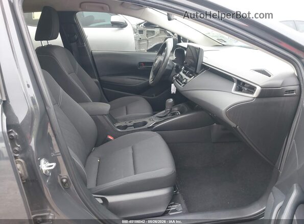 JTDBCMFE3P3023758 2023 TOYOTA COROLLA Серый Вид салона спереди
