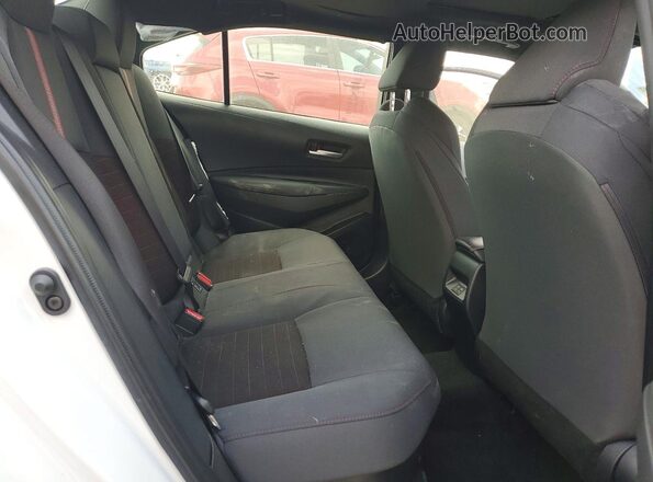 JTDBCMFE3RJ030790 2024 TOYOTA LL White Vista de los asientos traseros