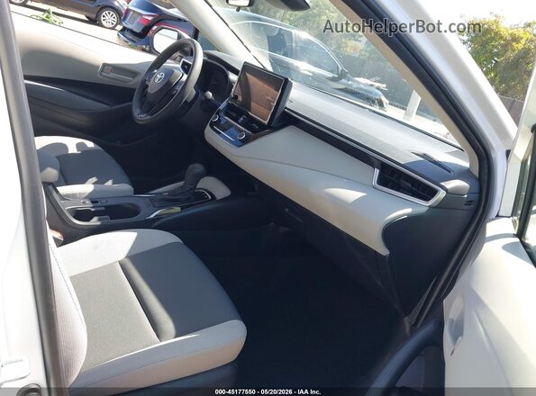 JTDBCMFE4T3131011 2026 TOYOTA COROLLA HYBRID White Vista interior delantera