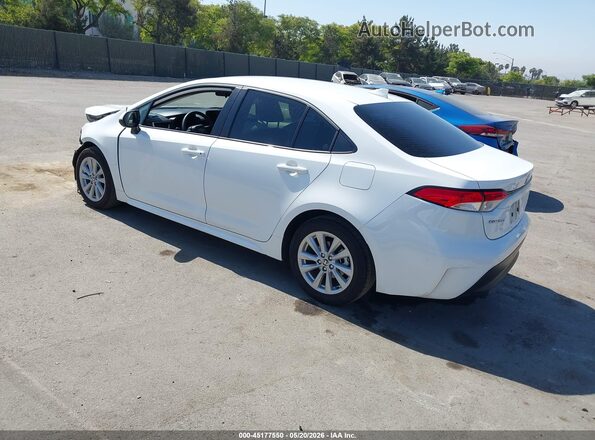 JTDBCMFE4T3131011 2026 TOYOTA COROLLA HYBRID White Trasero izquierdo