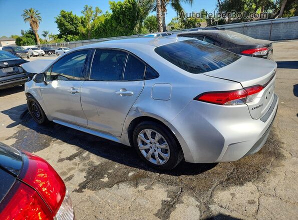 JTDBCMFE6PJ009266 2023 TOYOTA COROLLA Silver Trasero izquierdo