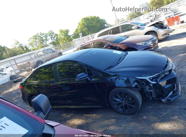 JTDBCMFE6SJ044656 2025 TOYOTA LL Black Вид задньої частини салону