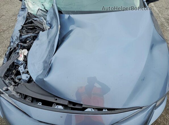 JTDBCMFE8S3079266 2025 TOYOTA COROLLA Blue Vista interior trasera