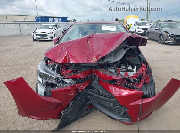 JTDBCMFE9RJ035461 2024 TOYOTA COROLLA Red Vista interior trasera