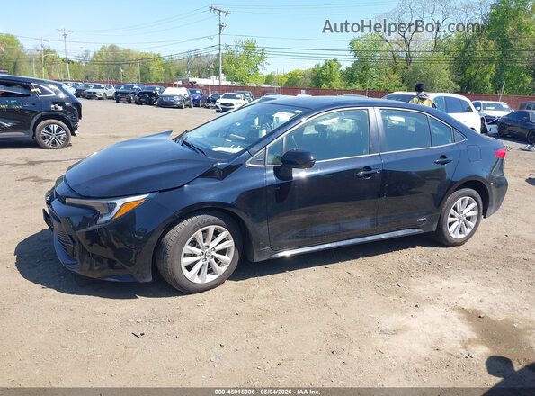 JTDBDMHE6T3027338 2026 TOYOTA LL Black Вид задньої частини салону